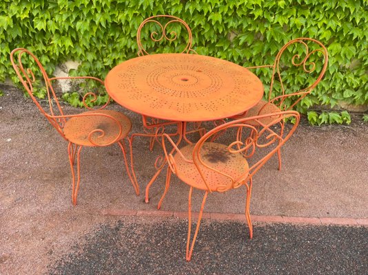 Wrought iron garden table and chairs for sale deals