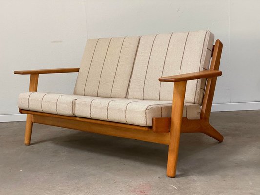 Mid-Century Danish Two-Seater Sofa in Oak by Hans J. Wegner Mid-Century Danish Two-Seater Sofa in Oak by Hans J. Wegner