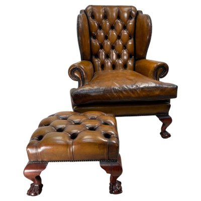 Hand Dyed Brown Leather Claw & Ball Chesterfield Wingback Armchair &  Footstool, Set of 2 for sale at Pamono