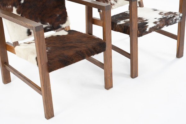 Armchairs in Cow Skin and Oak 1950 Set of 2 for sale at Pamono