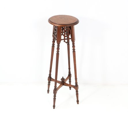 Pedestal plant table deals