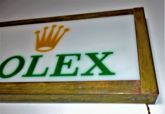 Cartel de distribuidor Rolex vintage grande de metal en venta en