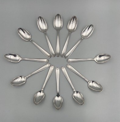 12 petites cuillères en métal argenté signées Christofle