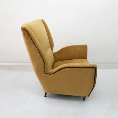 Mid Century Yellow Wingback Armchair 1950s for sale at Pamono