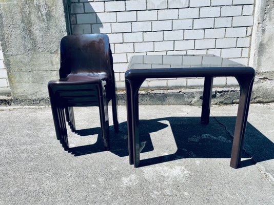 Selene Chairs and Stadio Table by Vico Magistretti for