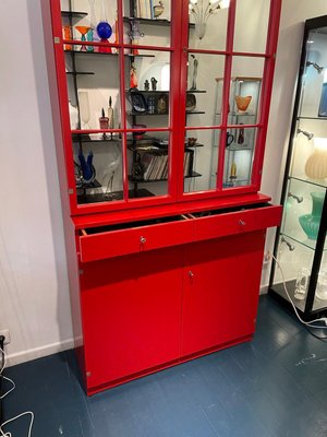 Red cabinet with glass doors deals