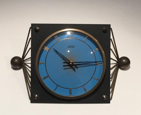 Reloj metal lacado, y latón, 50 en venta en Pamono