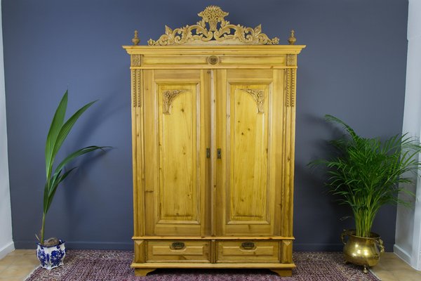 Baltic Pine Two Door Armoire with Carved Crown 1920s for sale at