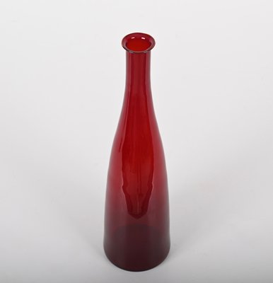 https://cdn20.pamono.com/p/g/1/3/1372749_hsb2a5g0up/mid-century-modern-smoked-ruby-red-blown-murano-glass-bottle-italy-1970s-3.jpg