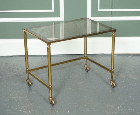 https://cdn20.pamono.com/p/g/1/3/1373243_8wgx0ihbsi/vintage-hollywood-regency-brass-glass-nest-of-tables-1950s-set-of-3-7.jpg