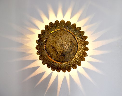 Light up sun wall on sale decor