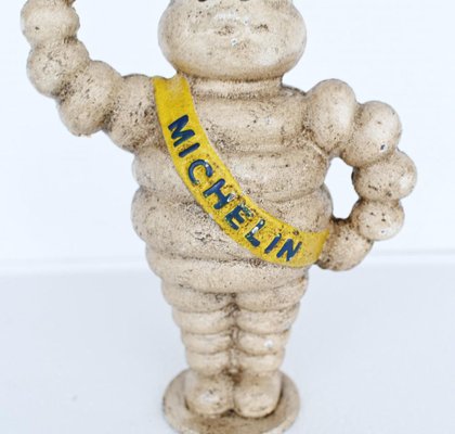 Cast Iron Michelin Tyre Man Statue for sale at Pamono
