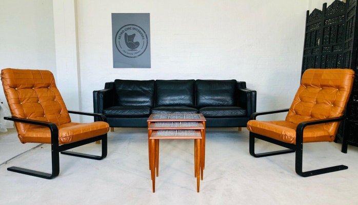 Black leather on sale couch and chair