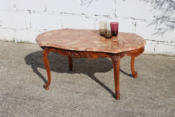 https://cdn20.pamono.com/p/g/1/3/1385063_2y6axfajrf/tavolino-da-caffe-vintage-in-marmo-e-legno-francia-anni-60-immagine-2.jpg