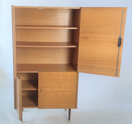 Mid century on sale modern linen cabinet