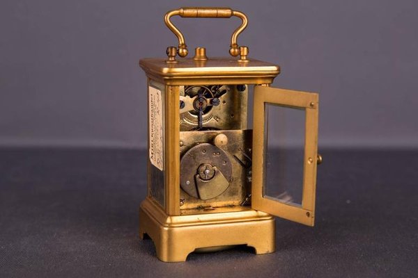 PENDULE BOULE AVEC LOUPE DE GROSSISSEMENT