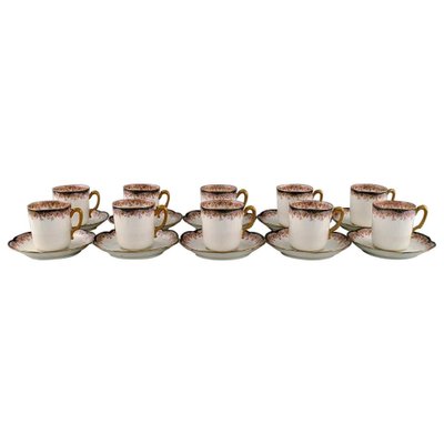 https://cdn20.pamono.com/p/g/1/4/1409838_omgcpo0869/mocha-cups-with-saucers-in-hand-painted-porcelain-from-limoges-france-1930s-set-of-20-1.jpg