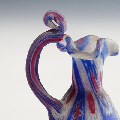 https://cdn20.pamono.com/p/g/1/4/1410531_i4dgmr3xhx/millefiori-murano-glass-pitcher-from-vetreria-fratelli-toso-1910s-5.jpg