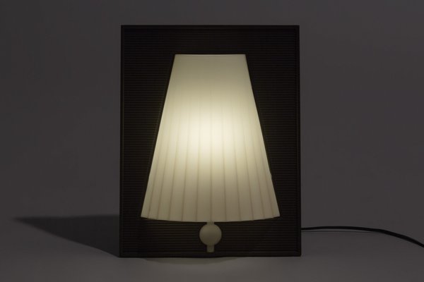 Lampada da parete Walla Walla di Philippe Starck per Flos