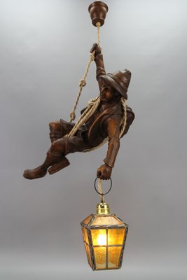 Large German Pendant Light Fixture with Carved Climber Figure and