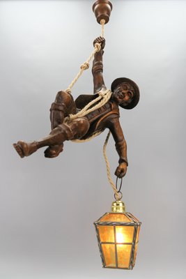 Large German Pendant Light Fixture with Carved Climber Figure and