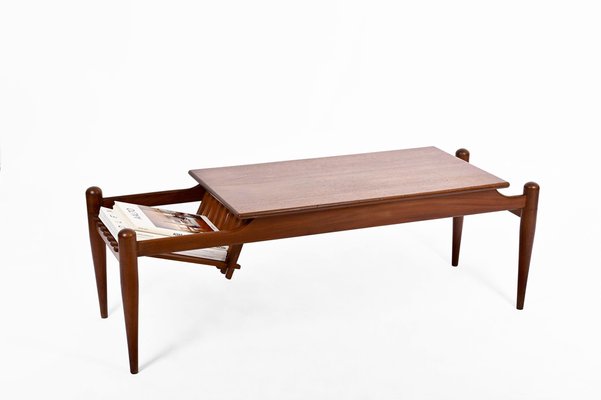 Magnus wheel coffee sale table with storage