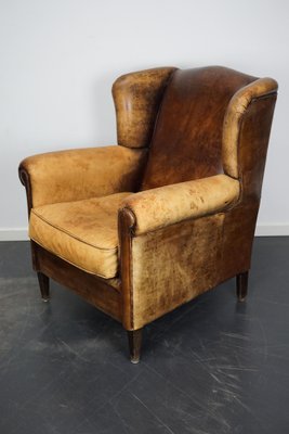 Cognac wingback chair hot sale