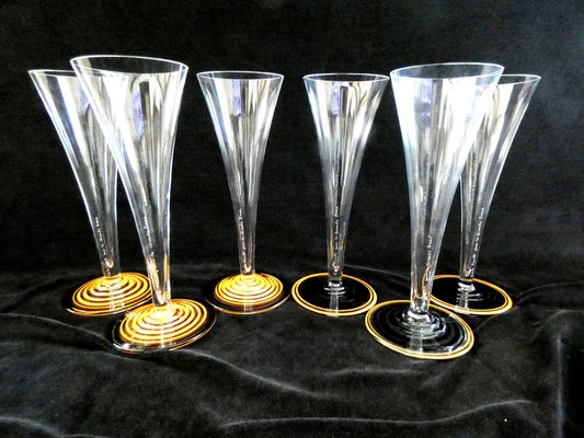 https://cdn20.pamono.com/p/g/1/4/1455774_s2vktb6402/murano-crystal-champagne-glasses-by-carlo-moretti-for-veuve-clicquot-pure-la-grande-dame-2000s-set-of-6-3.jpg