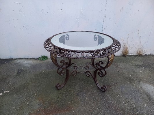 Glass top coffee tables wrought iron base online