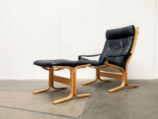 Leather easy chair clearance with ottoman