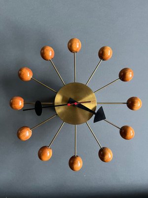 Ball Clock in Brass and Wood by George Nelson, 1955 for sale