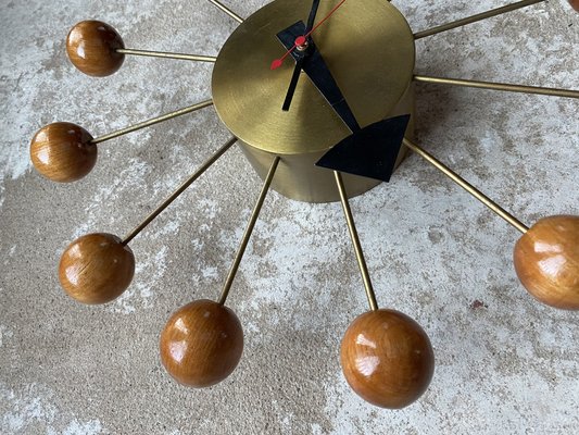Ball Clock in Brass and Wood by George Nelson, 1955 for sale at Pamono
