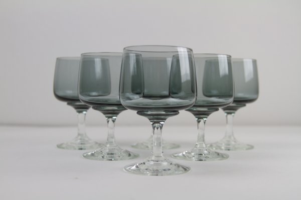 https://cdn20.pamono.com/p/g/1/4/1490249_yd58jqv7kq/vintage-danish-atlantic-white-wine-glasses-by-per-luetken-for-holmegaard-1960s-set-of-6-2.jpg