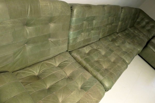 Olive green leather sofa deals