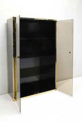 Gold and 2024 glass cabinet
