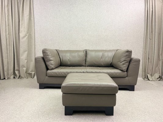 Two seater online sofa with footstool