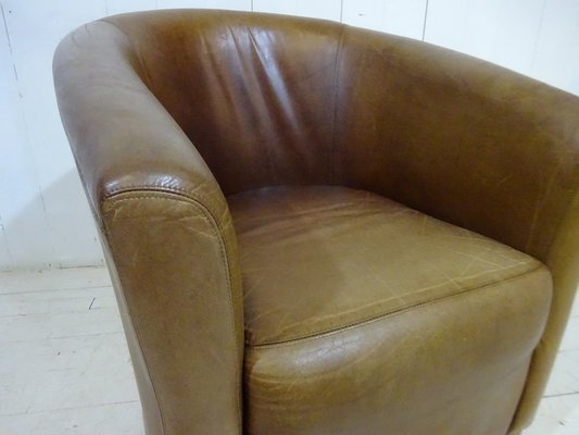 Distressed leather 2024 tub chair