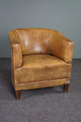 Vintage tan leather armchair deals