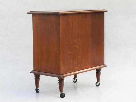 Modernist Bar Cabinet with Wheels in the style of Charles Dudouyt