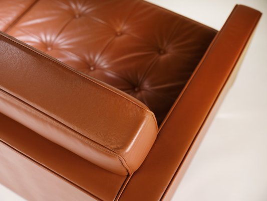 Bassett leather 2024 chair and ottoman
