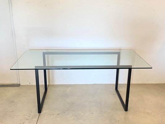 Iron and glass dining table online