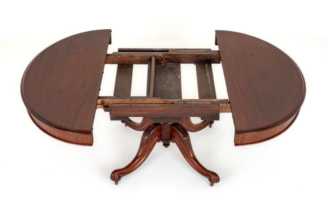 Expandable round dining clearance table for sale