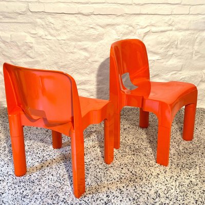 Model 4867 Molded Plastic Chairs in Orange by Joe Colombo for