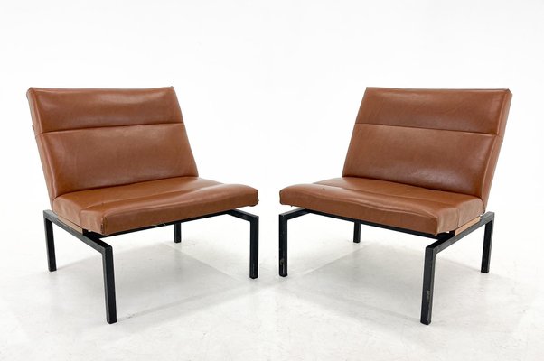 Leather and sale metal lounge chair