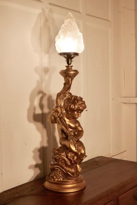 Antique 2024 cherub lamp