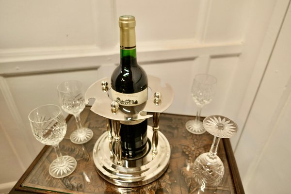 https://cdn20.pamono.com/p/g/1/5/1552511_7ru6cnlwws/silver-plated-wine-coaster-with-crystal-glasses-1960s-set-of-6-8.jpg
