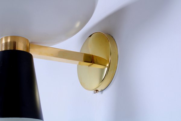 Black and brass wall sconce deals