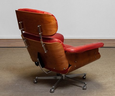 Red Reclinable Swivel Chair with Walnut Shells by Martin Stoll for