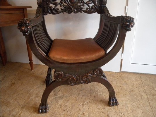 Antique lion head rocking chair deals