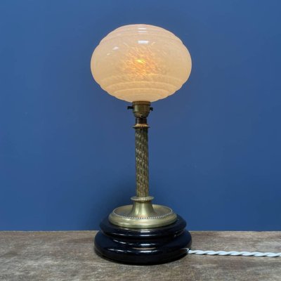 Antique brass lamp with glass globe outlet